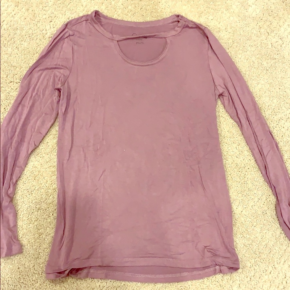 a purple long sleeve top